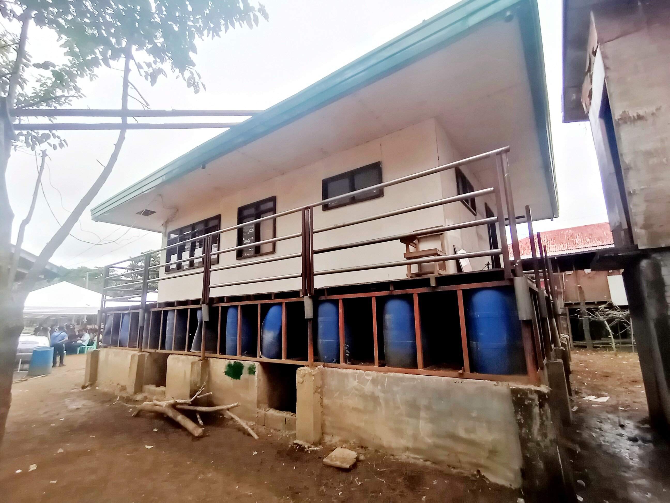 THIS daycare center houses Manobo families for weeks until flood recedes, the ‘brain’ of a hybrid solar power system (inset) and a satellite Internet modem.