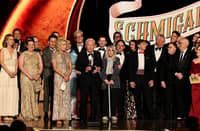 'SCHMIGADOON!' team accepts the Best Musical award.