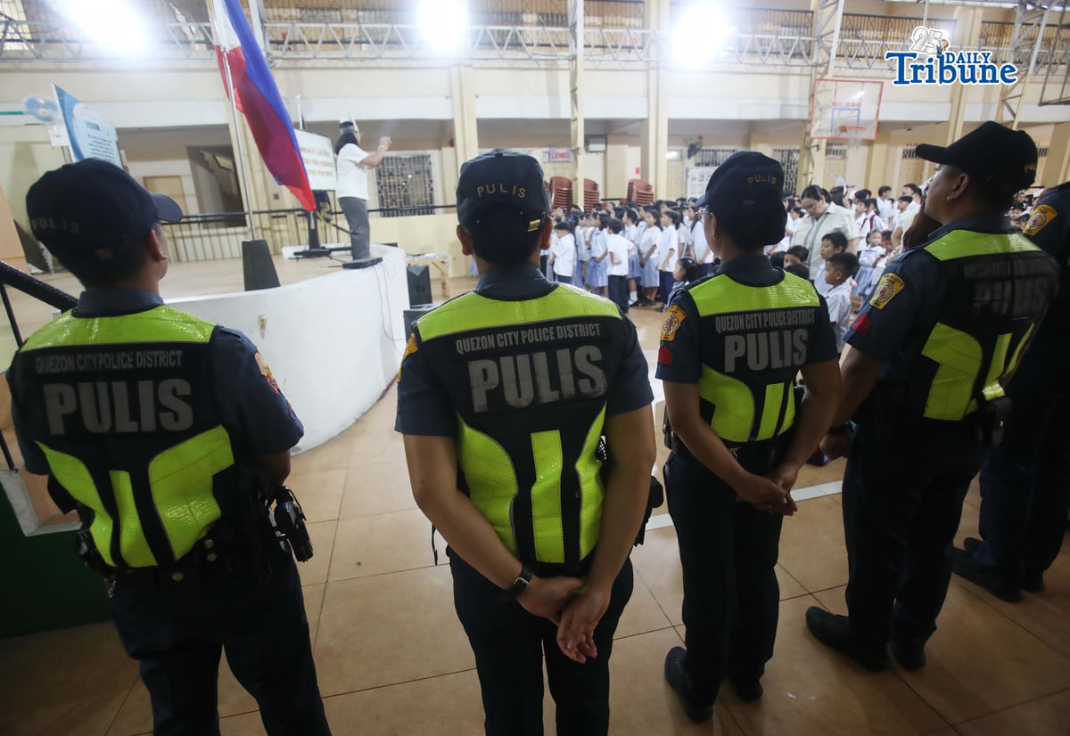 (June 08 2026) Quezon City Police District (QCPD) station 10 commander speaks to encourage the students to study well and be kind to others, at Marcelo H del Pilar Elementary School in Kamuning Quezon City on Monday during the first day of School year 2026. The Philippine National Police said they deployed police presence nationwide aimed to prevent crimes such as bullying, theft, and gang activities near campus perimeters. Photo/Analy Labor