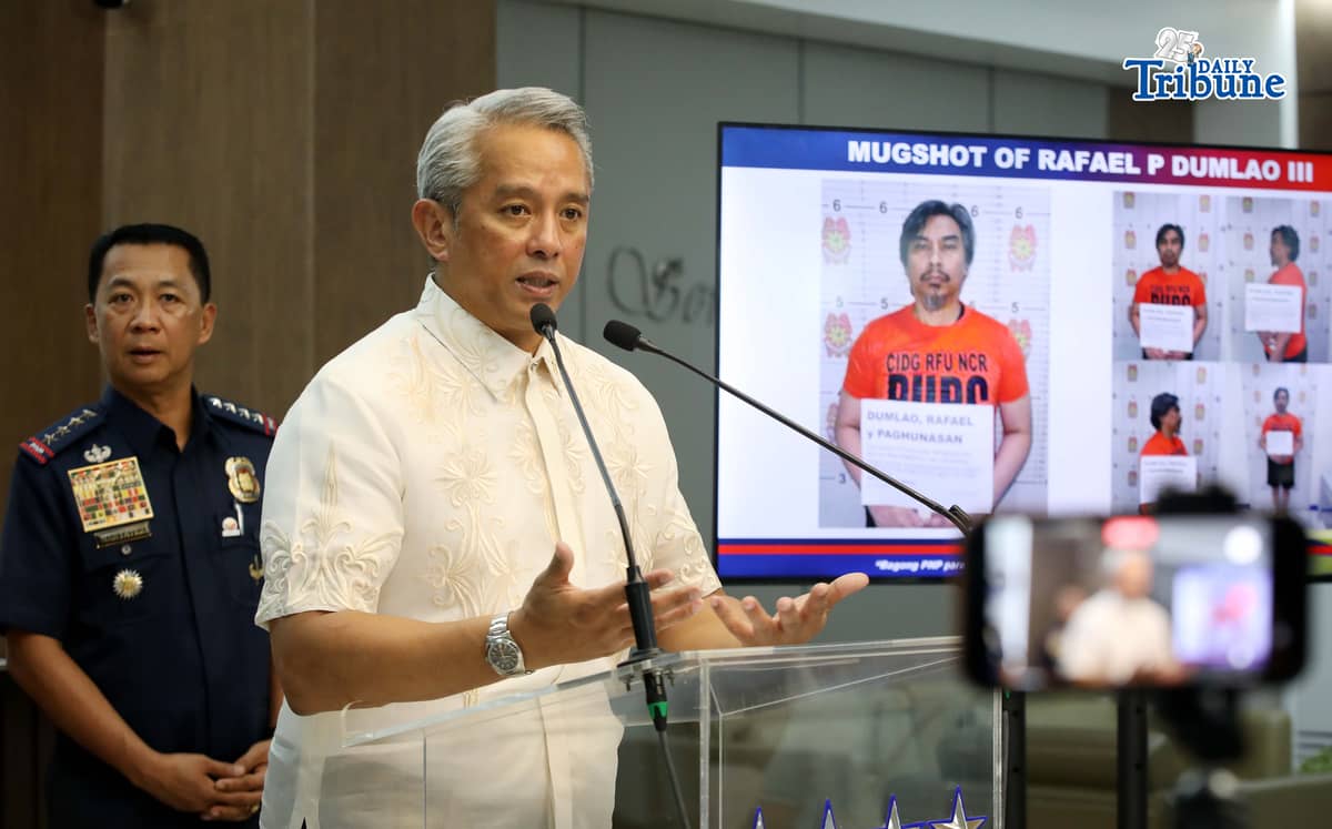 (June 09 2026) DILG Secretary Jonvic Remulla with PNP Chief Melencio Nartatez, show the mug shot of Police Lt. Col. Rafael Dumlao the government's highest-ranking suspect in the abduction and murder of South Korean businessman Jee Ick Joo in 2016, during the press conference at Camp Crame in Quezon City, following of the arrest of the suspect. Photo/Analy Labor