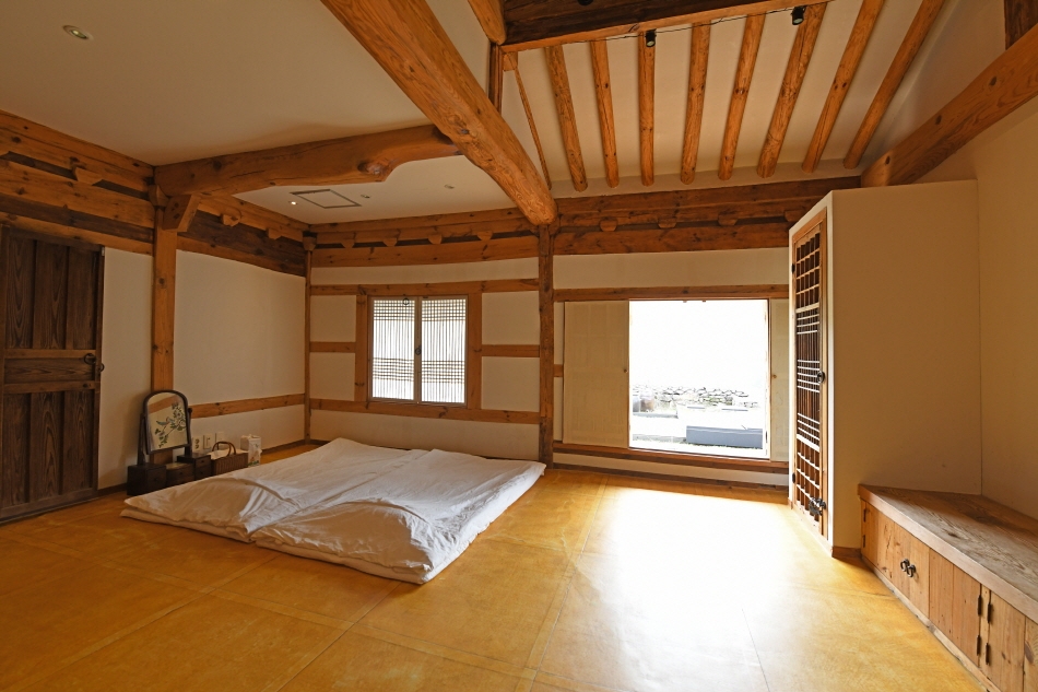 BUILT without nails or synthetic adhesives, the hanok showcases centuries-old building techniques enhanced by interiors lined with handmade hanji paper.