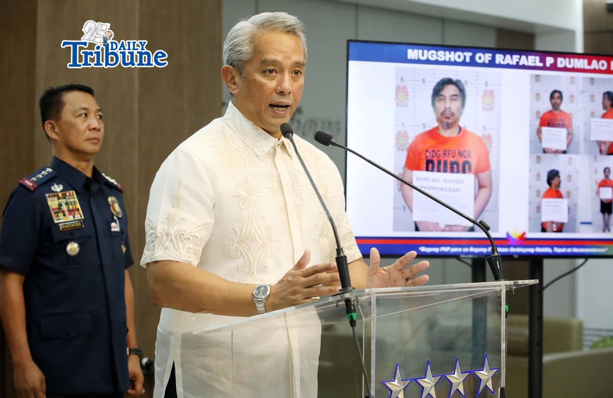 (June 09 2026) DILG Secretary Jonvic Remulla with PNP Chief Melencio Nartatez, show the mug shot of Police Lt. Col. Rafael Dumlao the government's highest-ranking suspect in the abduction and murder of South Korean businessman Jee Ick Joo in 2016, during the press conference at Camp Crame in Quezon City, following of the arrest of the suspect. Photo/Analy Labor