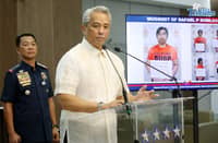 (June 09 2026) DILG Secretary Jonvic Remulla with PNP Chief Melencio Nartatez, show the mug shot of Police Lt. Col. Rafael Dumlao the government's highest-ranking suspect in the abduction and murder of South Korean businessman Jee Ick Joo in 2016, during the press conference at Camp Crame in Quezon City, following of the arrest of the suspect. Photo/Analy Labor