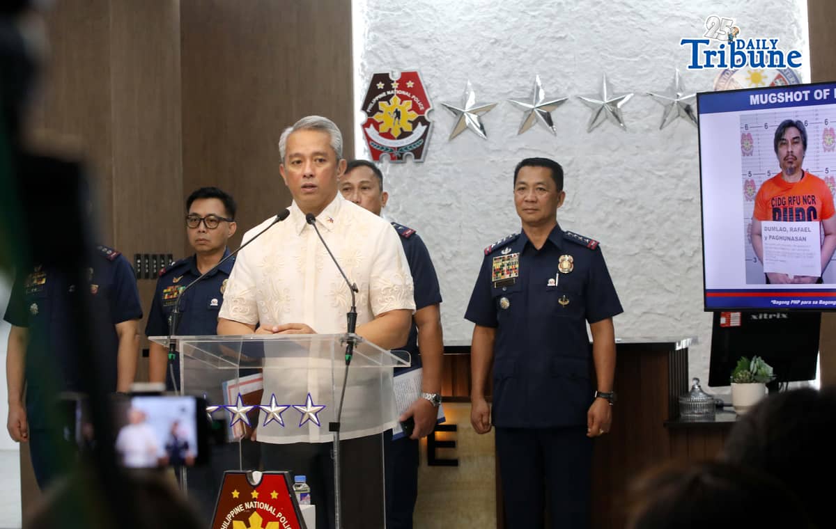 (June 09 2026) DILG Secretary Jonvic Remulla with PNP Chief Melencio Nartatez, show the mug shot of Police Lt. Col. Rafael Dumlao the government's highest-ranking suspect in the abduction and murder of South Korean businessman Jee Ick Joo in 2016, during the press conference at Camp Crame in Quezon City, following of the arrest of the suspect. Photo/Analy Labor