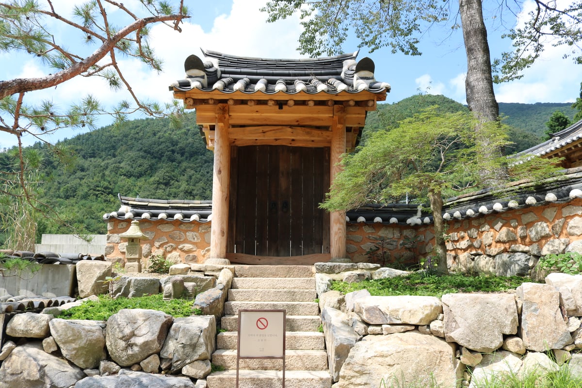 VISITORS can explore interconnected courtyards, stone pathways and wooden halls that reflect the elegance of Joseon-era residential architecture.