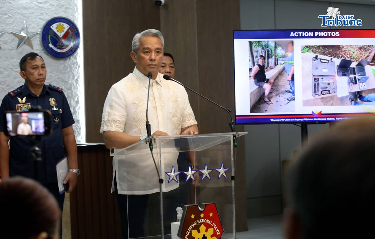 (June 09 2026) DILG Secretary Jonvic Remulla with PNP Chief Melencio Nartatez, show the mug shot of Police Lt. Col. Rafael Dumlao the government's highest-ranking suspect in the abduction and murder of South Korean businessman Jee Ick Joo in 2016, during the press conference at Camp Crame in Quezon City, following of the arrest of the suspect. Photo/Analy Labor