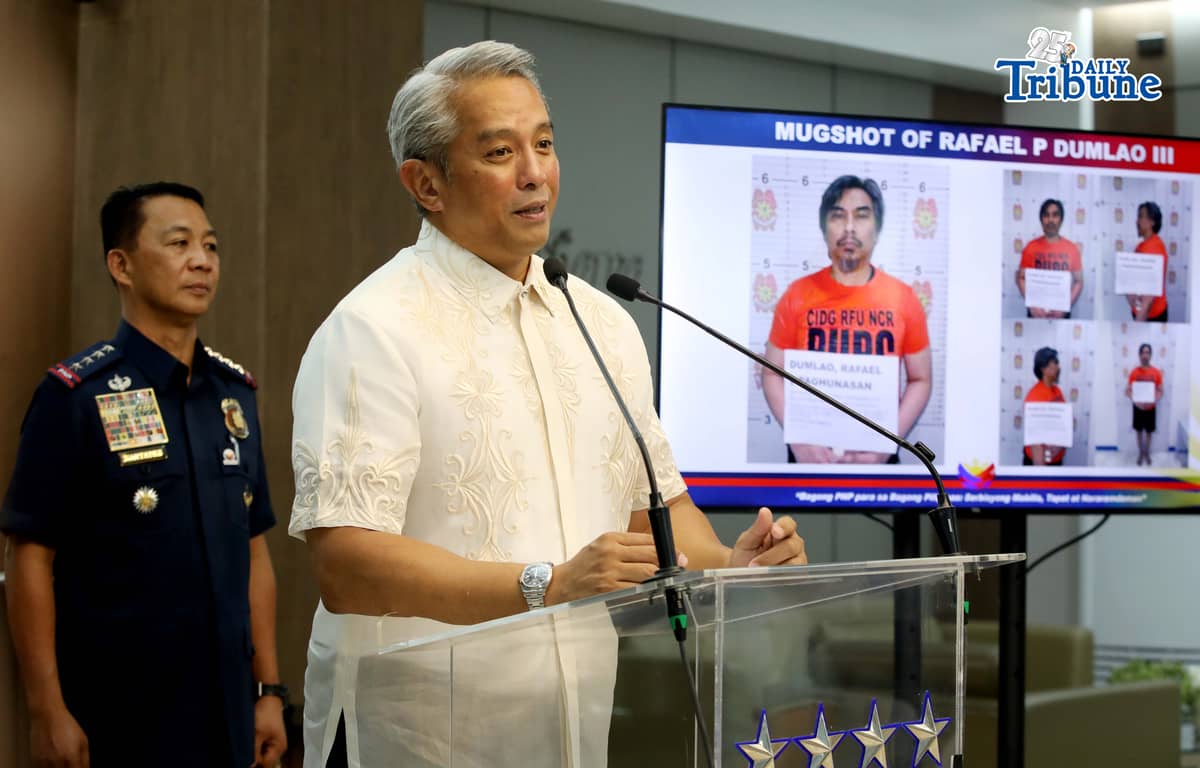 (June 09 2026) DILG Secretary Jonvic Remulla with PNP Chief Melencio Nartatez, show the mug shot of Police Lt. Col. Rafael Dumlao the government's highest-ranking suspect in the abduction and murder of South Korean businessman Jee Ick Joo in 2016, during the press conference at Camp Crame in Quezon City, following of the arrest of the suspect. Photo/Analy Labor