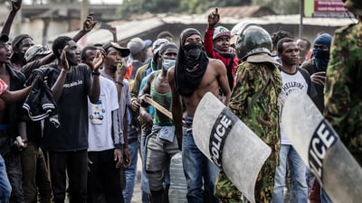 One killed as Kenyan protests at US Ebola centre turn violent