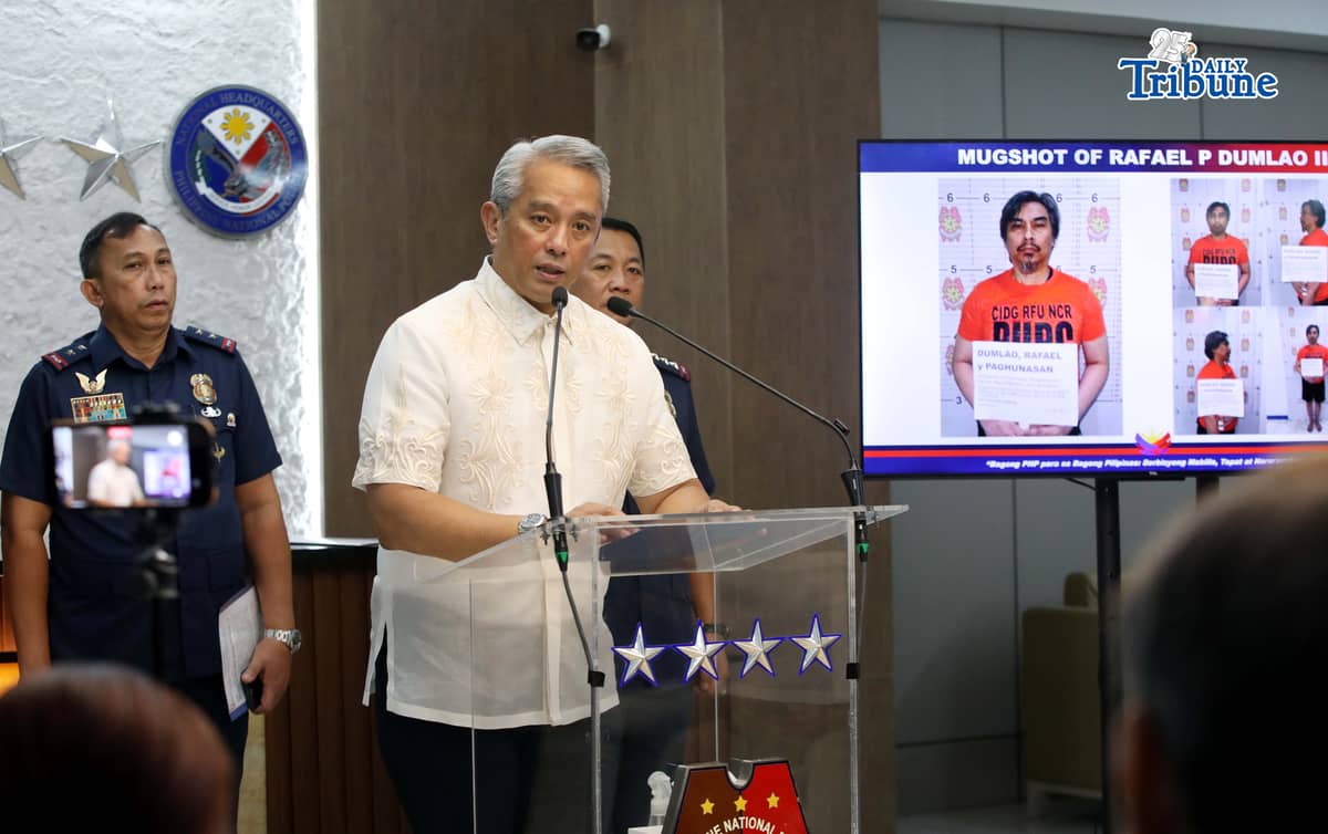 (June 09 2026) DILG Secretary Jonvic Remulla with PNP Chief Melencio Nartatez, show the mug shot of Police Lt. Col. Rafael Dumlao the government's highest-ranking suspect in the abduction and murder of South Korean businessman Jee Ick Joo in 2016, during the press conference at Camp Crame in Quezon City, following of the arrest of the suspect. Photo/Analy Labor