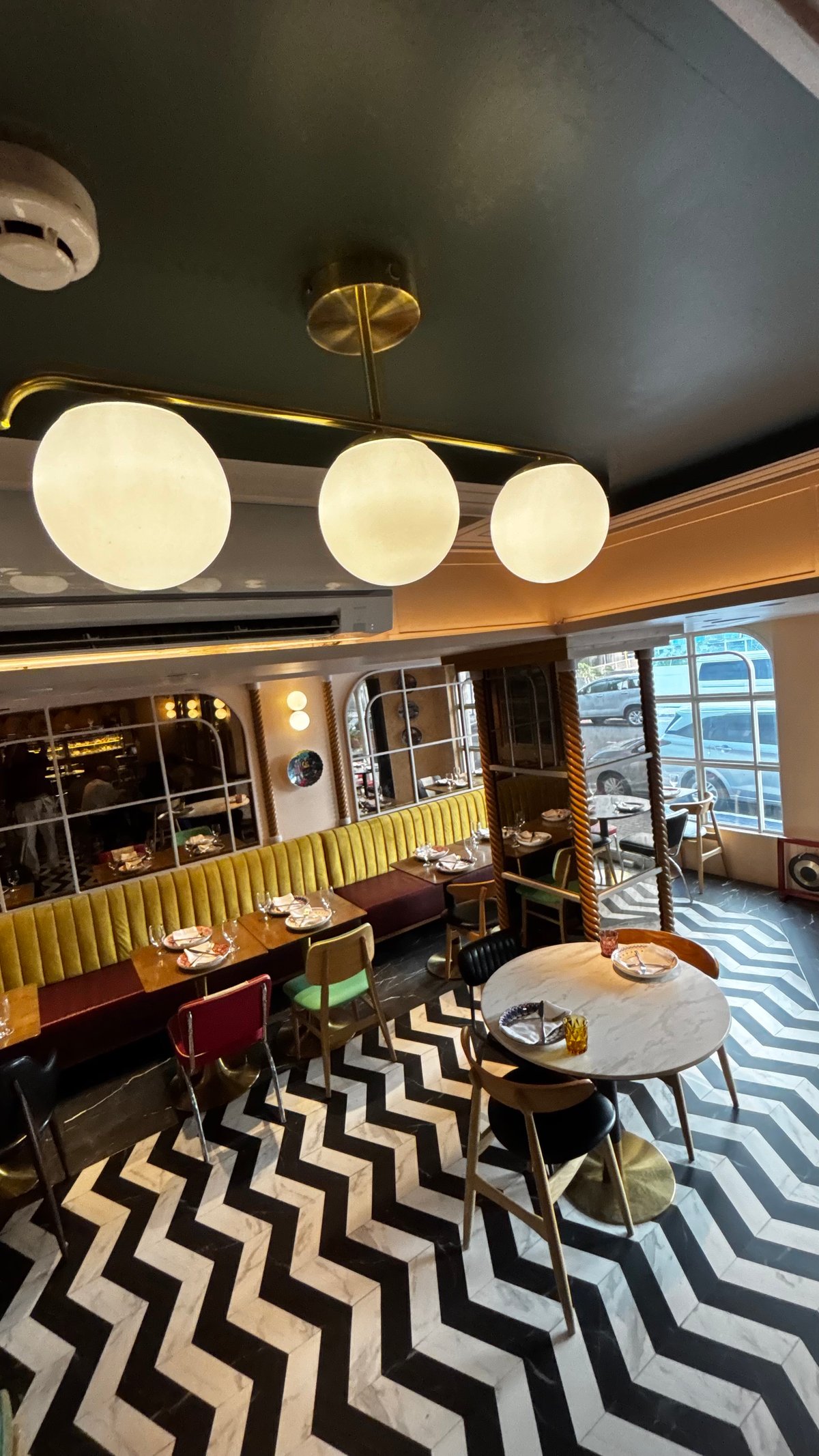 Al Bacchio’s interiors mimic a traditional trattoria.