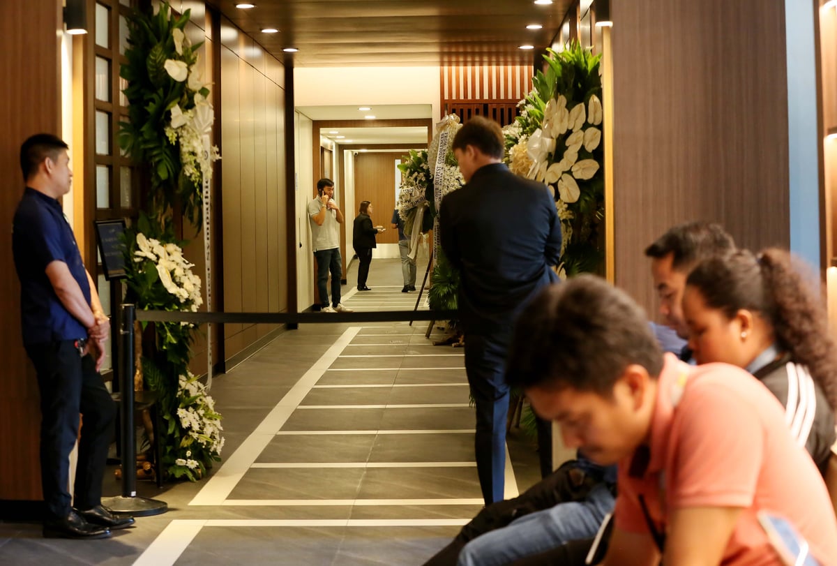 Flowers are placed outside the wake room of Ateneo student-athlete Rene Baterbonia at Arlington Memorial Chapels in Quezon City on Wednesday, 10 June 2026, as family, friends, and supporters pay their respects. | 📷 Analy Labor