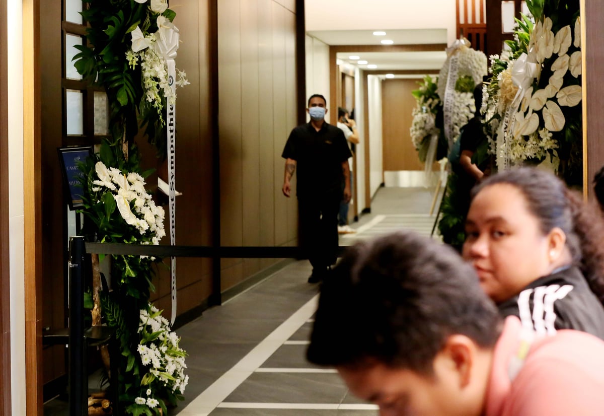 Flowers are placed outside the wake room of Ateneo student-athlete Rene Baterbonia at Arlington Memorial Chapels in Quezon City on Wednesday, 10 June 2026, as family, friends, and supporters pay their respects. | 📷 Analy Labor