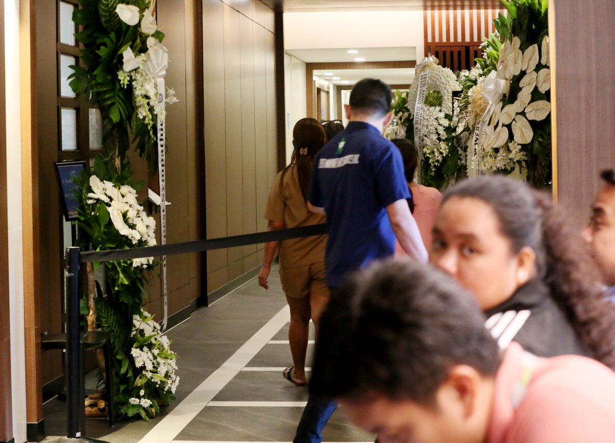 Flowers are placed outside the wake room of Ateneo student-athlete Rene Baterbonia at Arlington Memorial Chapels in Quezon City on Wednesday, 10 June 2026, as family, friends, and supporters pay their respects. | 📷 Analy Labor