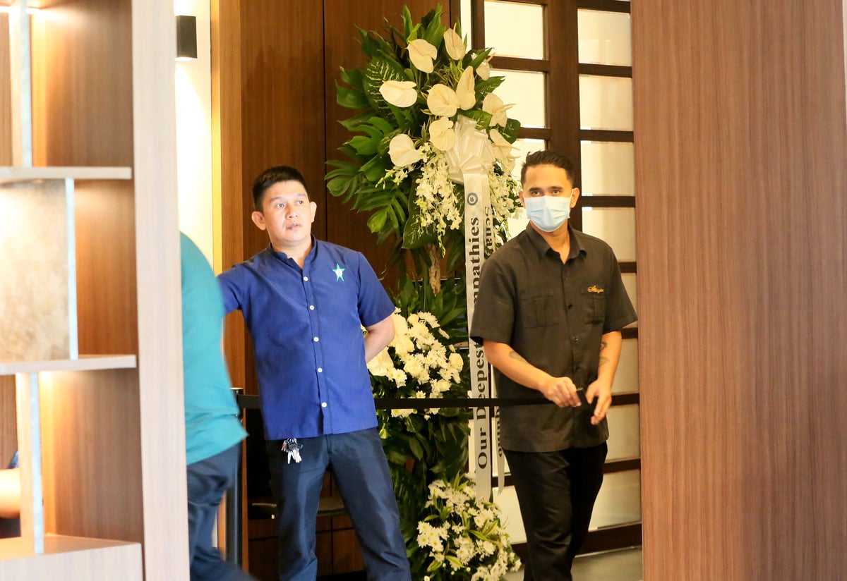 Flowers are placed outside the wake room of Ateneo student-athlete Rene Baterbonia at Arlington Memorial Chapels in Quezon City on Wednesday, 10 June 2026, as family, friends, and supporters pay their respects. | 📷 Analy Labor