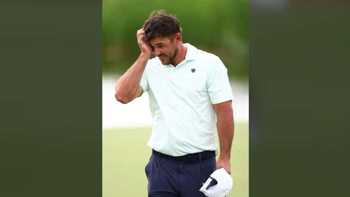 BROOKS Koepka walks off the 18th green after completing his first round at the 2026 RBC Canadian Open at TPC Toronto at Osprey Valley on Thursday in Caledon, Ontario.