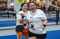 CHRISTIE Angelie Villarante and Joey Ann Ramos celebrate after conquering the women’s newbie event of the 1st ArenaPlus-KaTribu Pickleball Tournament on Friday at The Dink Lab Elite inside All Home in Kawit, Cavite.