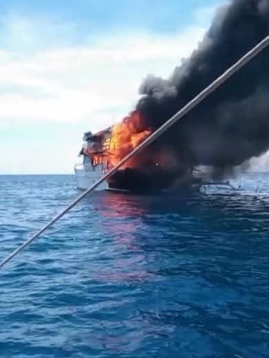 Yacht catches fire off the waters of Glan