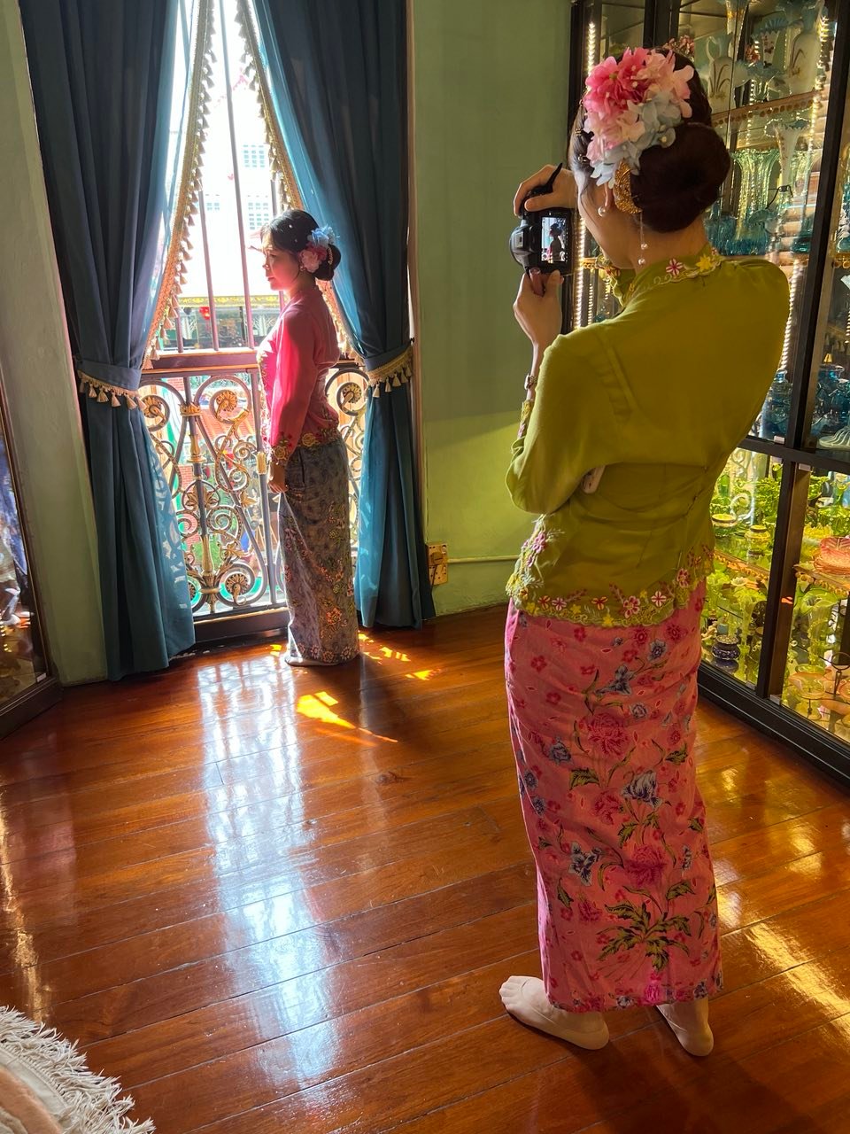 YOUNG maidens in traditional attire.