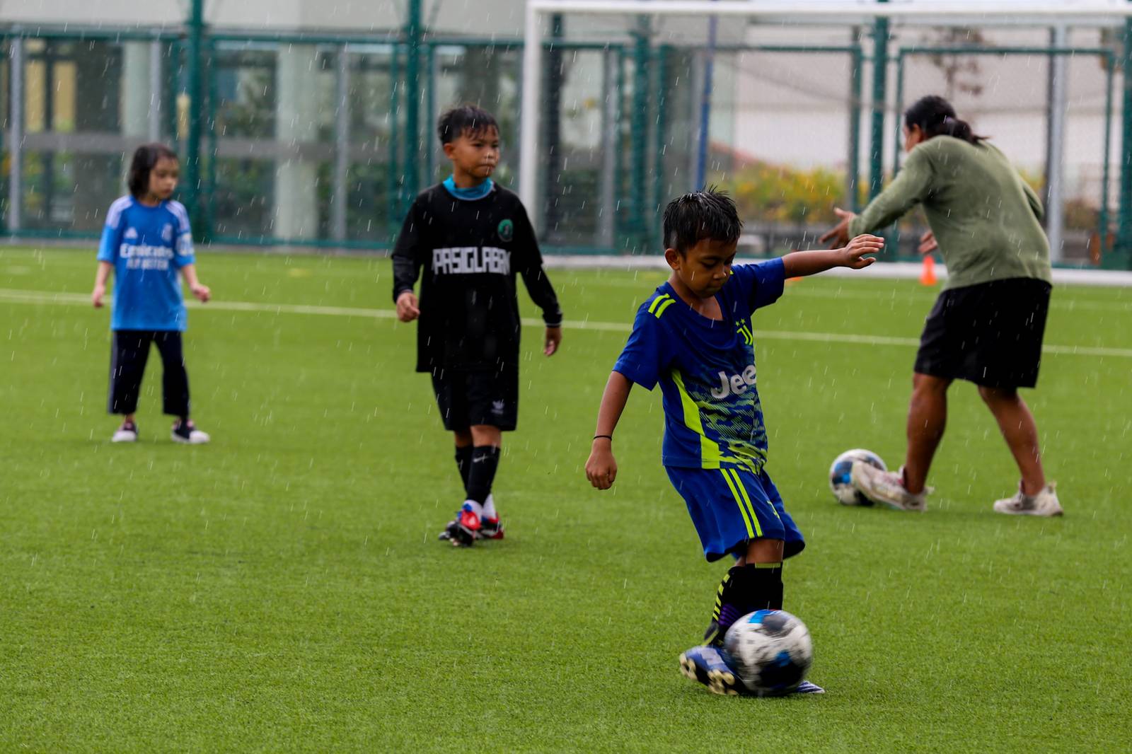 Children participate in a football clinic at SM Mall of Asia’s Adidas Football Park in Pasay City on 13 June 2026. Held as part of the Pinoy Football Fiesta, the event was organized in partnership with the Embassies of Canada, Mexico and the United States to highlight the power of sports in uniting nations, cultures, and people.