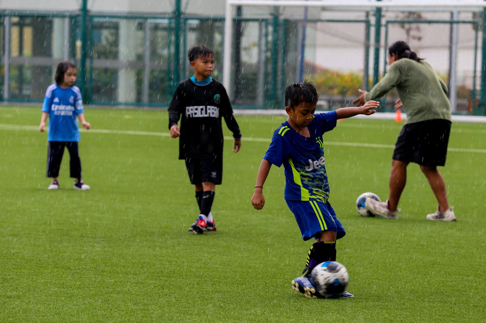 Children participate in a football clinic at SM Mall of Asia’s Adidas Football Park in Pasay City on 13 June 2026. Held as part of the Pinoy Football Fiesta, the event was organized in partnership with the Embassies of Canada, Mexico and the United States to highlight the power of sports in uniting nations, cultures, and people.
