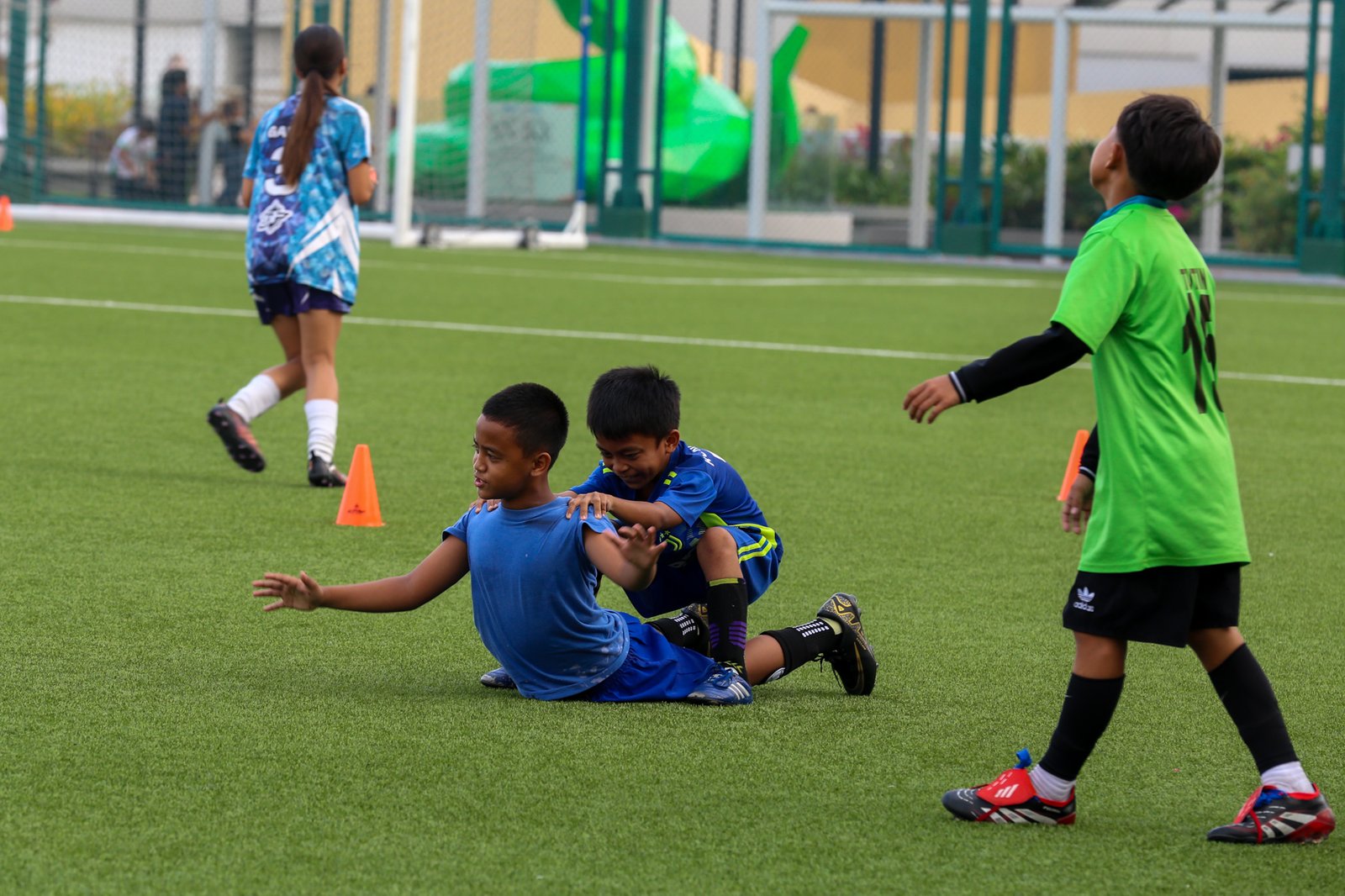 Children participate in a football clinic at SM Mall of Asia’s Adidas Football Park in Pasay City on 13 June 2026. Held as part of the Pinoy Football Fiesta, the event was organized in partnership with the Embassies of Canada, Mexico and the United States to highlight the power of sports in uniting nations, cultures, and people.