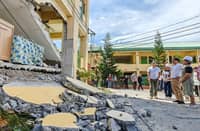CLASSES must go on Undeterred by earthquake damage, President Marcos (third from right) inspects General Santos City National High School to fast-track rehabilitation of school facilities, even as alternative learning modalities keep on schedule students education.