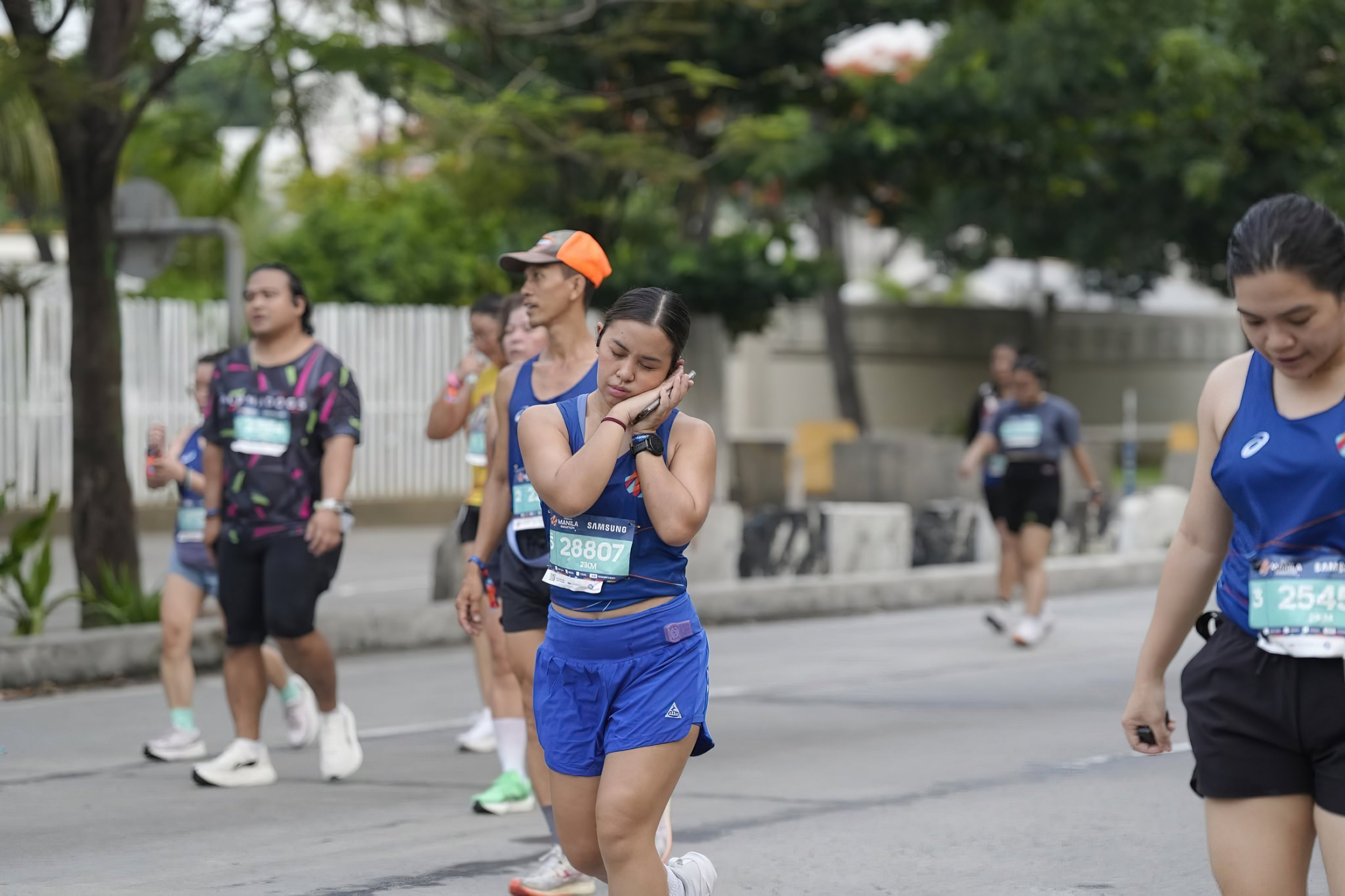 A PARTICIPANTS strikes a playful pose.