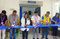 LEGANES Primary Care Facility OIC Dr. Michelle Jaen Krafft and BDO Network Bank branch head Marco Hugolino Casiple (center), lead the ceremonial ribbon cutting for the upgraded LPCF in Poblacion, Leganes, Iloilo on 11 June 2026.