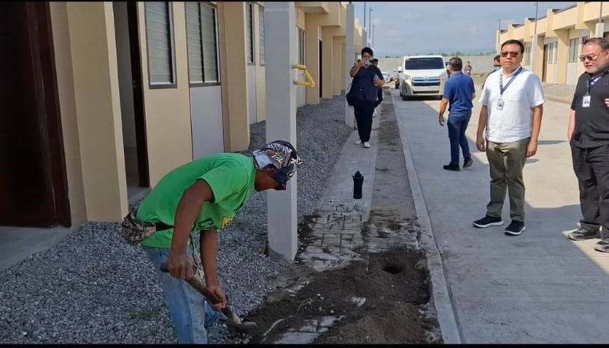 SECRETARY Aliling (second from right) inspects completed house-and-lot units at the Deca Homes Gensan 2 Development in Barangay Apopong, General Santos City.