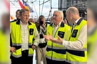 LUFTHANSA Technik CEO Soeren Stark (left), and Holger Beck, CEO and president, Lufthansa Technik Philippines (right), orient Federal Republic of Germany president Frank Walter Steinmeier (center) during his visit to the German firm’s headquarters in Pasay City on Tuesday.