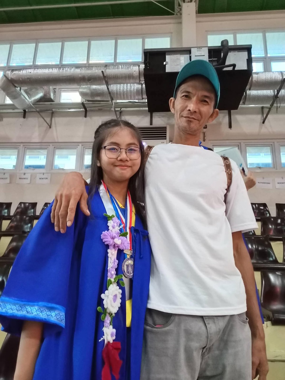 MY graduation with my father
