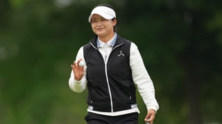 Liu rides wind to the top
