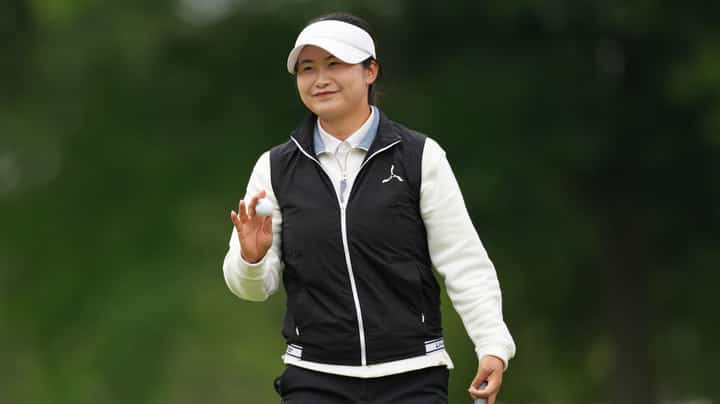 Liu rides wind to the top