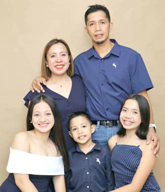 BOUND by love. Bryan with his wife Roxanne and their three children- Erriane, Briella and Brix.