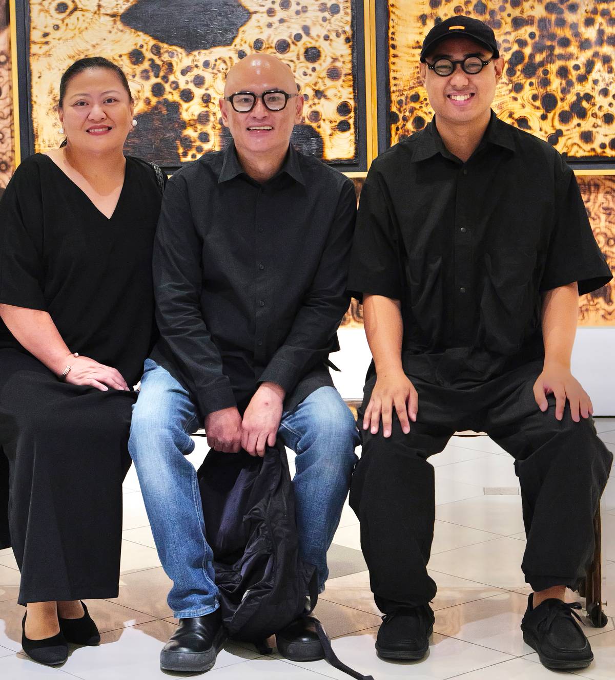 TARA Y. Santos, exhibiting artist Marco Y. Santos and Vien Valencia.