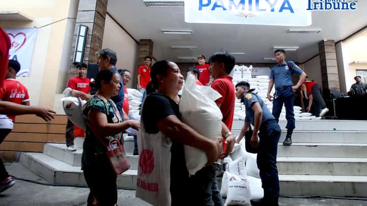 (June 22 2026) Residents at Barangay Dona Imelda in Quezon City on Monday June 22 2026, queued to receive a 10 kilos of rice during the First Lady rice distribution drive launching. First Lady Louise Araneta Marcos spearheaded a rice distribution drive through community visits within Metro Manila, it is inspired by simple belief that every Family deserves food on the table is an initiative to provide immediate assistance to families across metropolis. Photo/Analy Labor