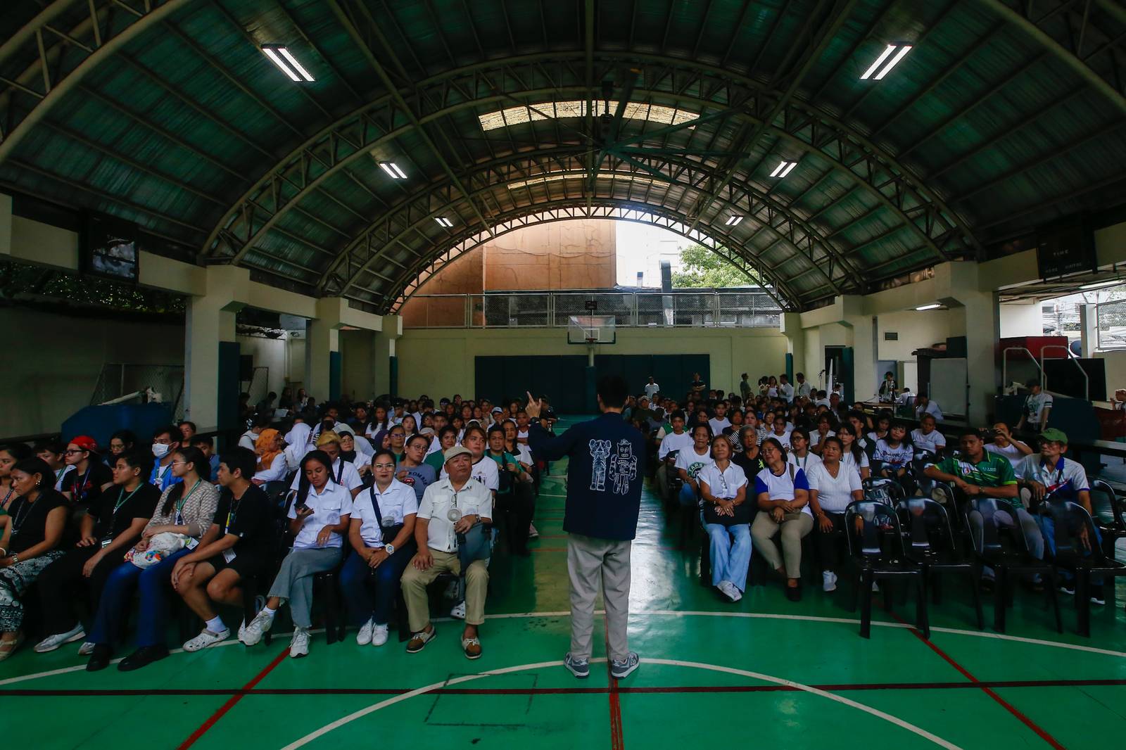 Students, workers, civil society groups, and community leaders gather for a public forum at the Sandejas Gym in De La Salle-College of Saint Benilde (DLS-CSB), Manila on 23 June 2026. Organized by Bantay Senado, the Center for Social Action, and the School of Diplomacy and Governance, the forum aims to provide local leaders with a shared, accurate, and process-based understanding of the current impeachment proceedings and upcoming developments.