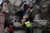 NOT everyone made it out of their buildings when two earthquakes of magnitude 7.2 and 7.5 struck the same area of Venezuela on the evening of 24 June. Rescue workers helped people out of collapsed buildings in Caracas.