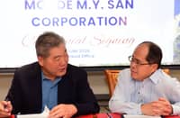 PHILIPPINE Economic Zone Authority Director General Tereso Panga (right) and Monde M.Y. San general manager Keng Sun Mar exchange notes about the Registration Agreement that they just signed as the maker of household favorite Skyflakes gets set to operate inside the TECO Industrial Park-Special Economic Zone in Mabalacat, Pampanga. Monde will invest P5 billion for the manufacturing site.