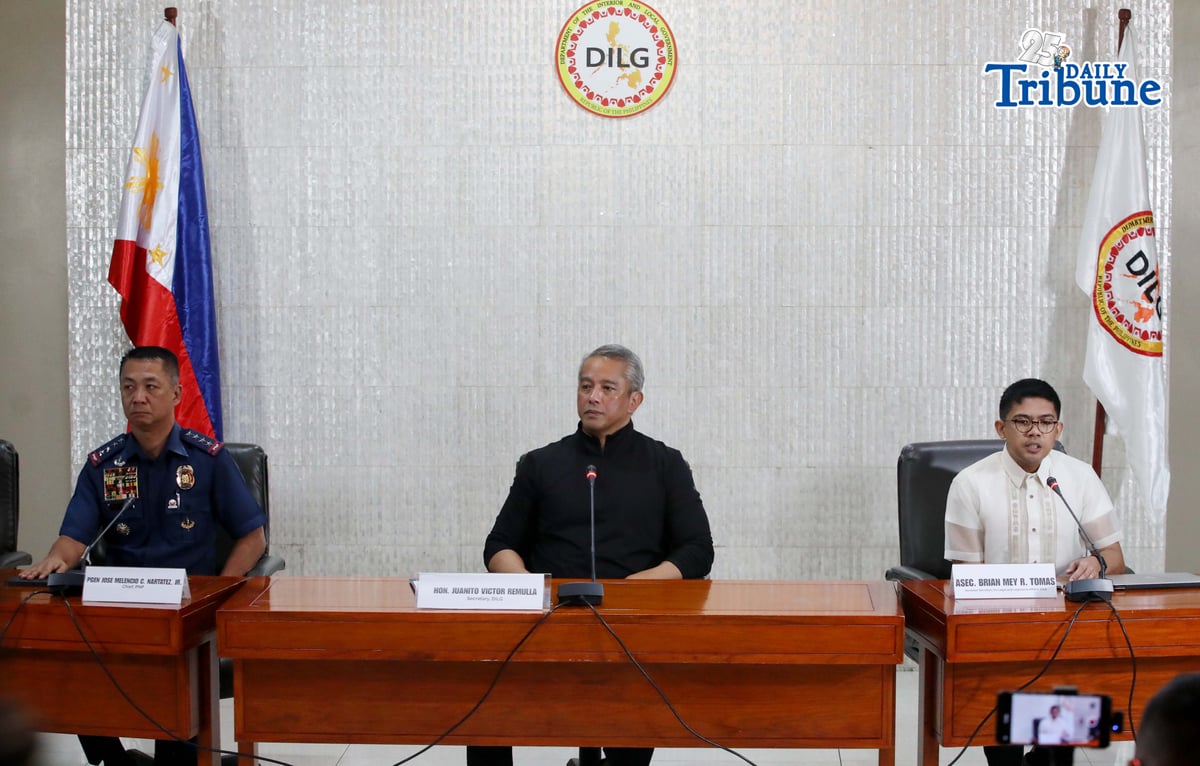 Interior Secretary Jonvic Remulla announces that former Ateneo men's basketball coach Tab Baldwin and 10 others have been recommended for charges under the Anti-Hazing Act of 2018 over the deaths of Ateneo student-athletes Rene Clert Baterbonia and Divine Adili during a press conference on Friday. | Photo by Analy Labor