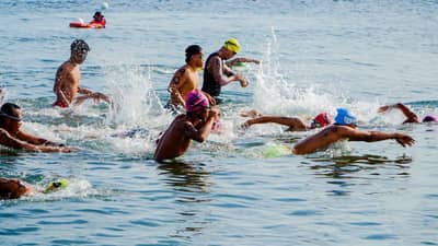 PARTICIPANTS of the Open Water Swim Challenge at the Lagundi Beach in Mambajao test their endurance as part of the Hibok-Hibok Festival.