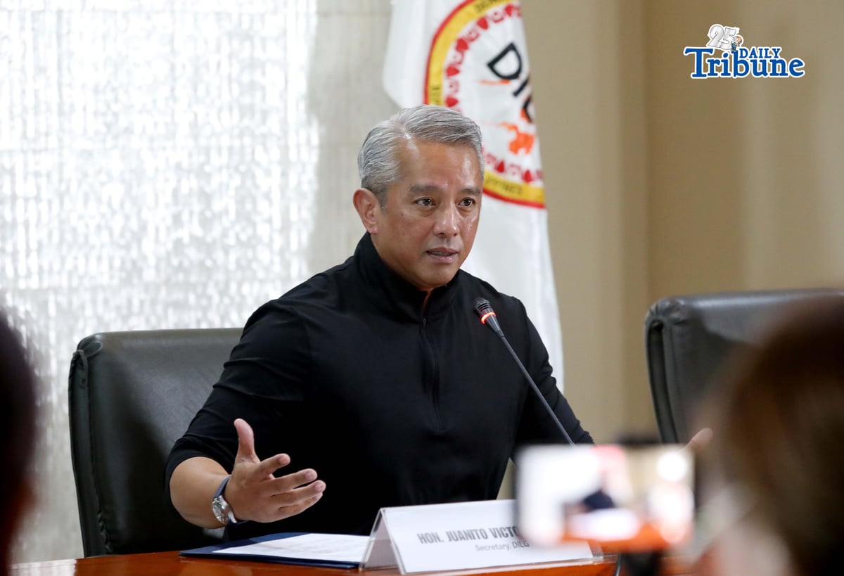 Interior Secretary Jonvic Remulla announces that former Ateneo men's basketball coach Tab Baldwin and 10 others have been recommended for charges under the Anti-Hazing Act of 2018 over the deaths of Ateneo student-athletes Rene Clert Baterbonia and Divine Adili during a press conference on Friday. | Photo by Analy Labor