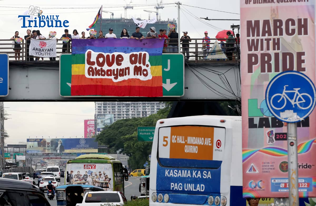 A day before the annual Pride March, volunteers from Akbayan Youth unfurl a rainbow banner reading, “Love All, Akbayan Mo! #PrideEquality,” on the Philcoa footbridge in Quezon City on Friday, calling for equality, dignity and recognition of every person's identity. | Photo by Analy Labor