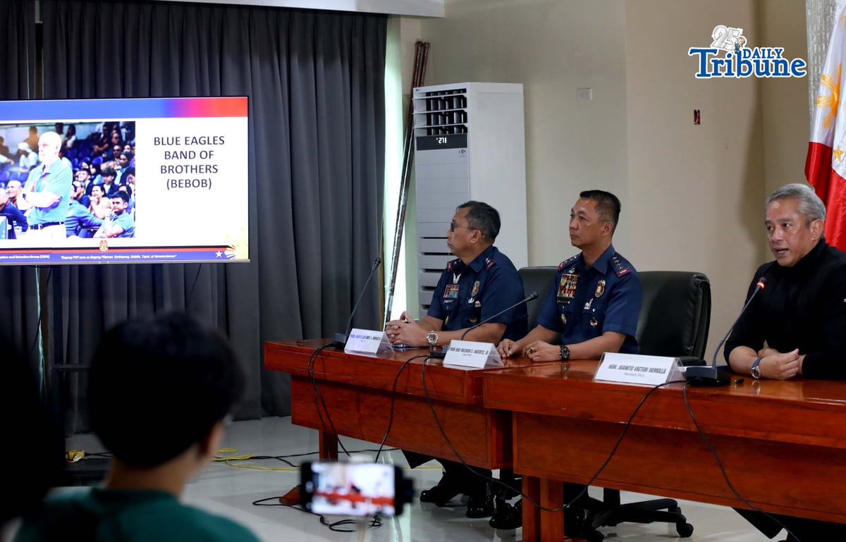 Interior Secretary Jonvic Remulla announces that former Ateneo men's basketball coach Tab Baldwin and 10 others have been recommended for charges under the Anti-Hazing Act of 2018 over the deaths of Ateneo student-athletes Rene Clert Baterbonia and Divine Adili during a press conference on Friday. | Photo by Analy Labor