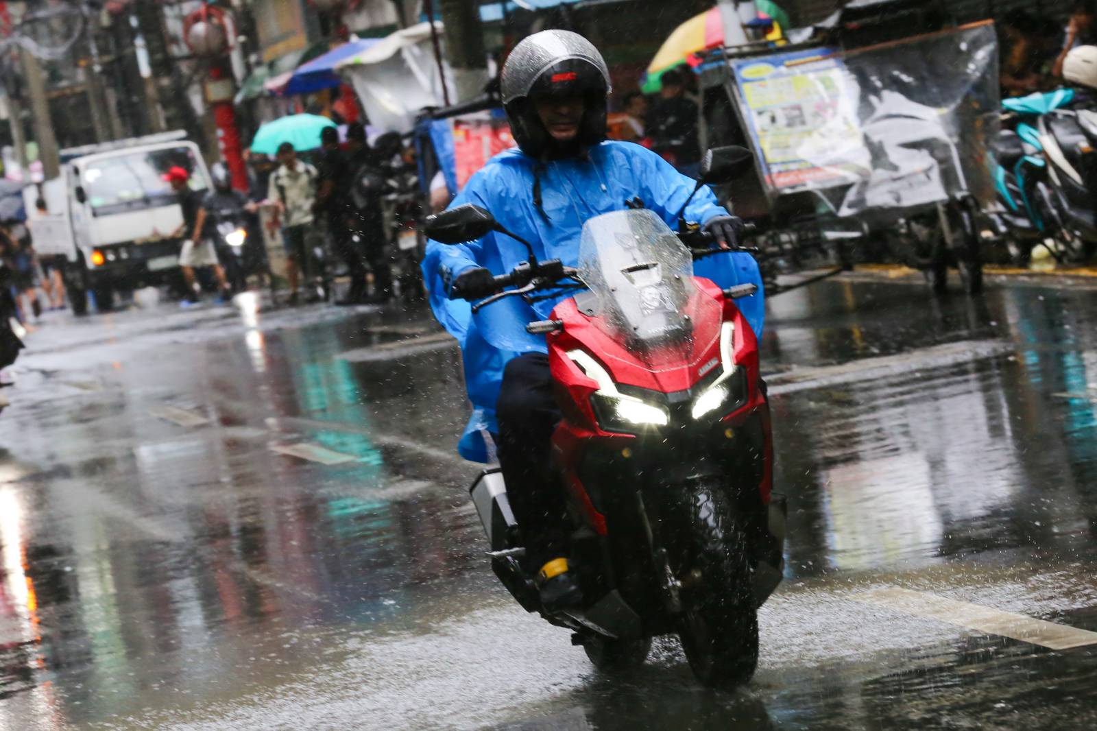 Umbrellas and raincoats are out along Soler Street in Manila on 27 June 2026 as the southwest monsoon, or "Habagat," and the Intertropical Convergence Zone (ITCZ) bring rains across several parts of the country. According to PAGASA, Habagat is expected to bring cloudy skies with scattered rain showers and thunderstorms over Metro Manila.