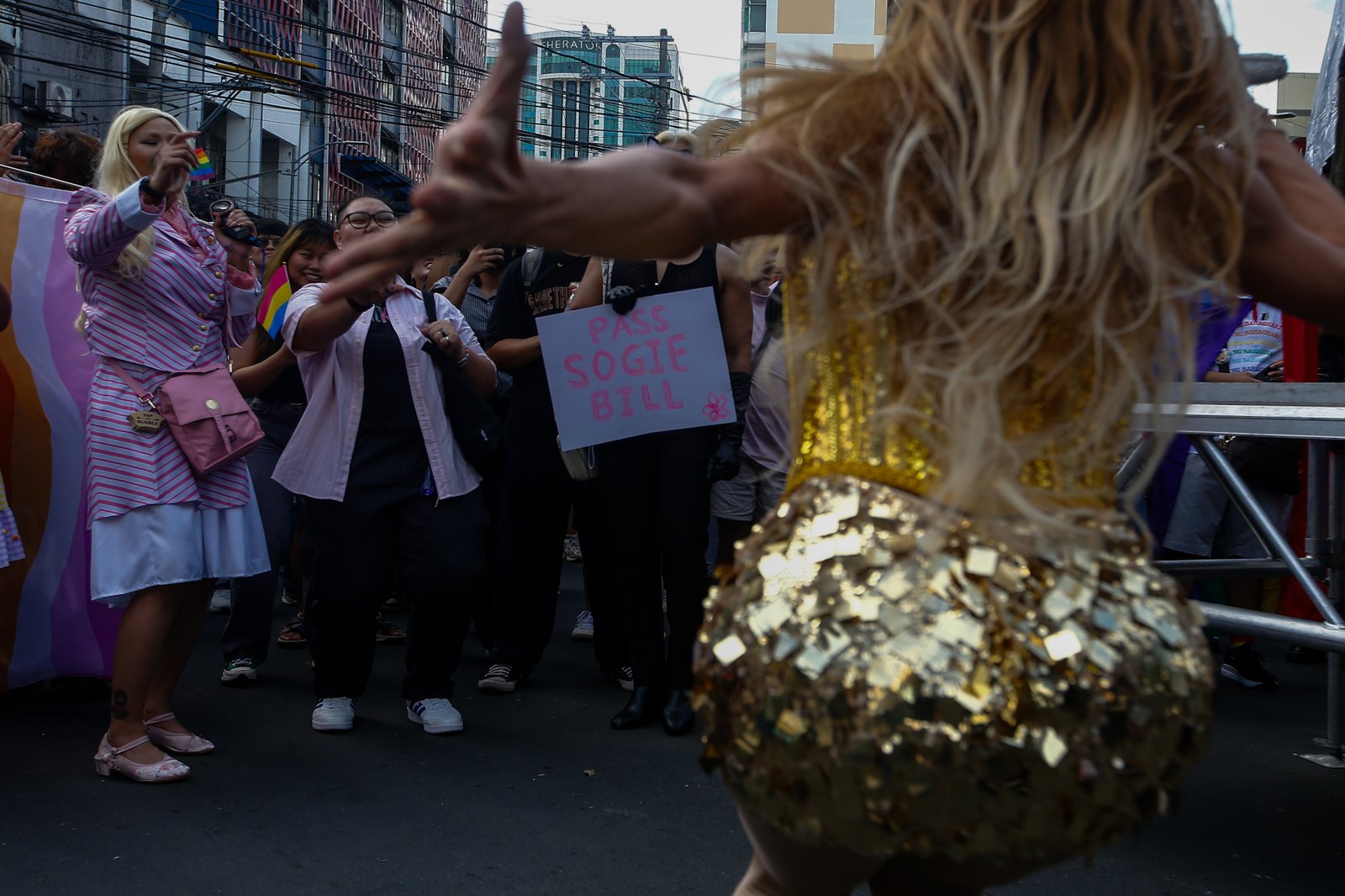 Members of the LGBTQIA+ community and their allies gather at Remedios Circle in Manila on 27 June 2026 during the Metro Pride March and Festival, calling for equality, dignity, justice, and human rights.