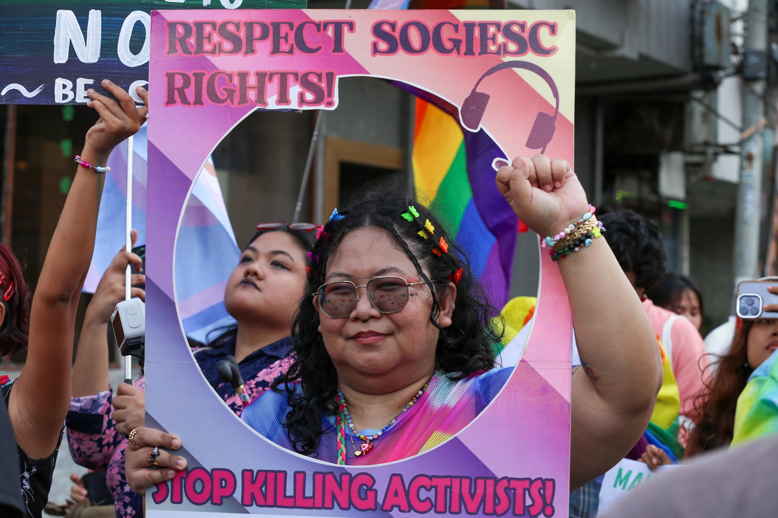 Members of the LGBTQIA+ community and their allies gather at Remedios Circle in Manila on 27 June 2026 during the Metro Pride March and Festival, calling for equality, dignity, justice, and human rights.