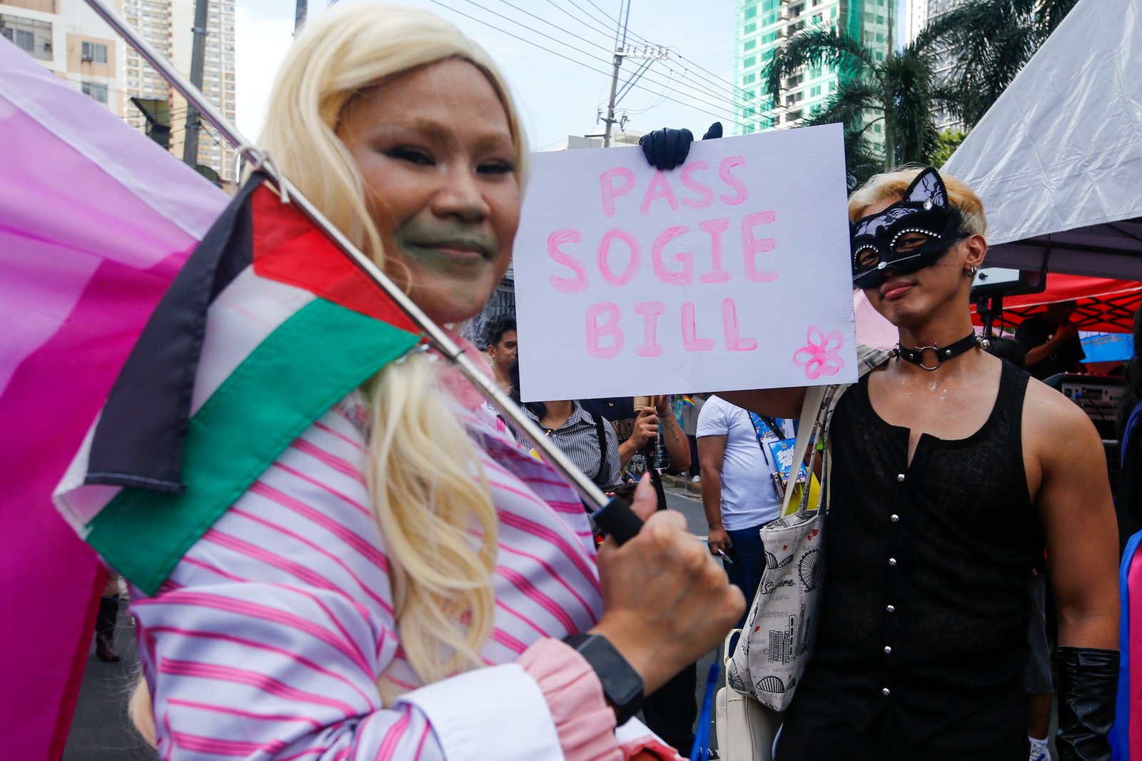 Members of the LGBTQIA+ community and their allies gather at Remedios Circle in Manila on 27 June 2026 during the Metro Pride March and Festival, calling for equality, dignity, justice, and human rights.