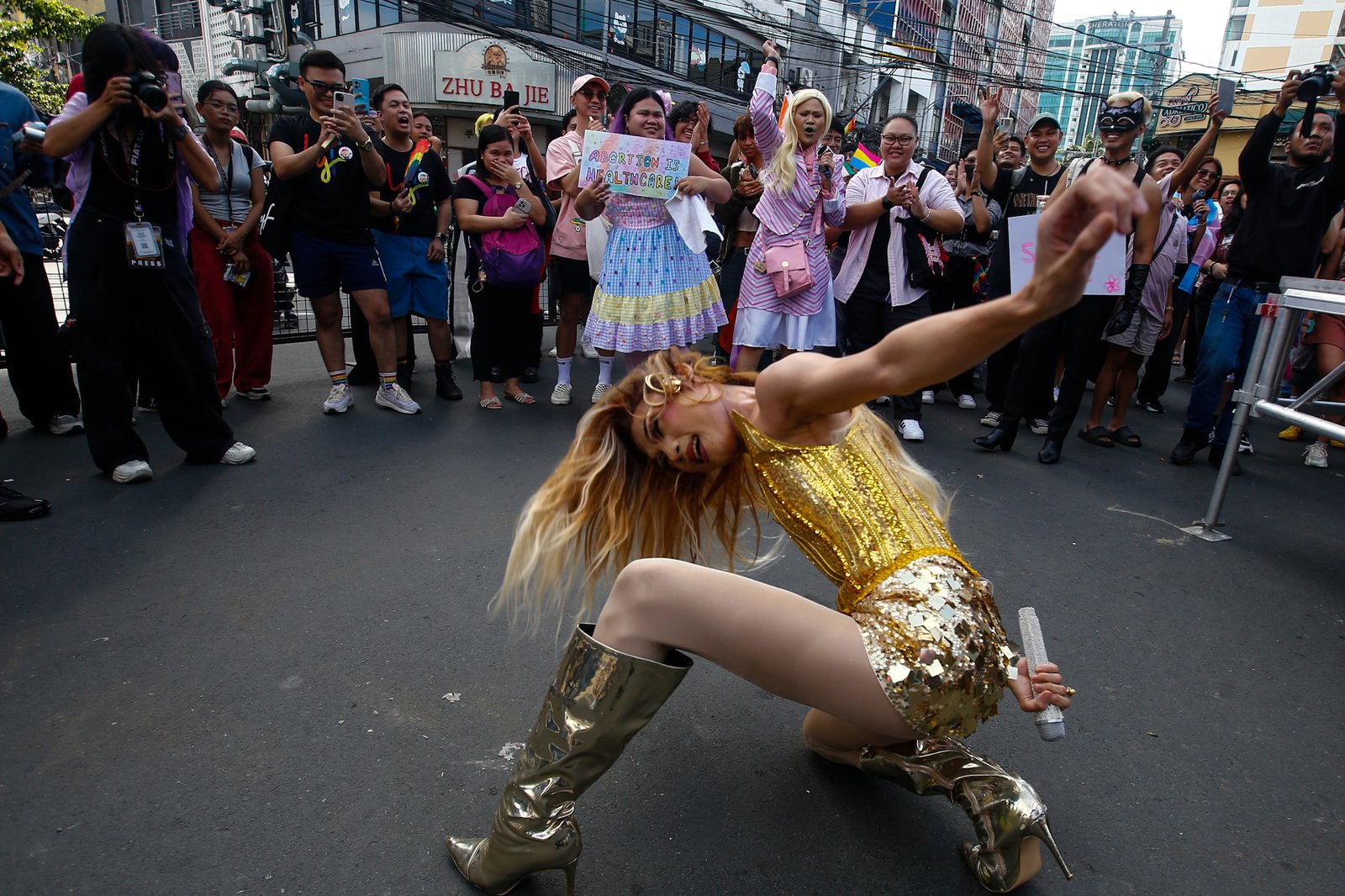 Members of the LGBTQIA+ community and their allies gather at Remedios Circle in Manila on 27 June 2026 during the Metro Pride March and Festival, calling for equality, dignity, justice, and human rights.