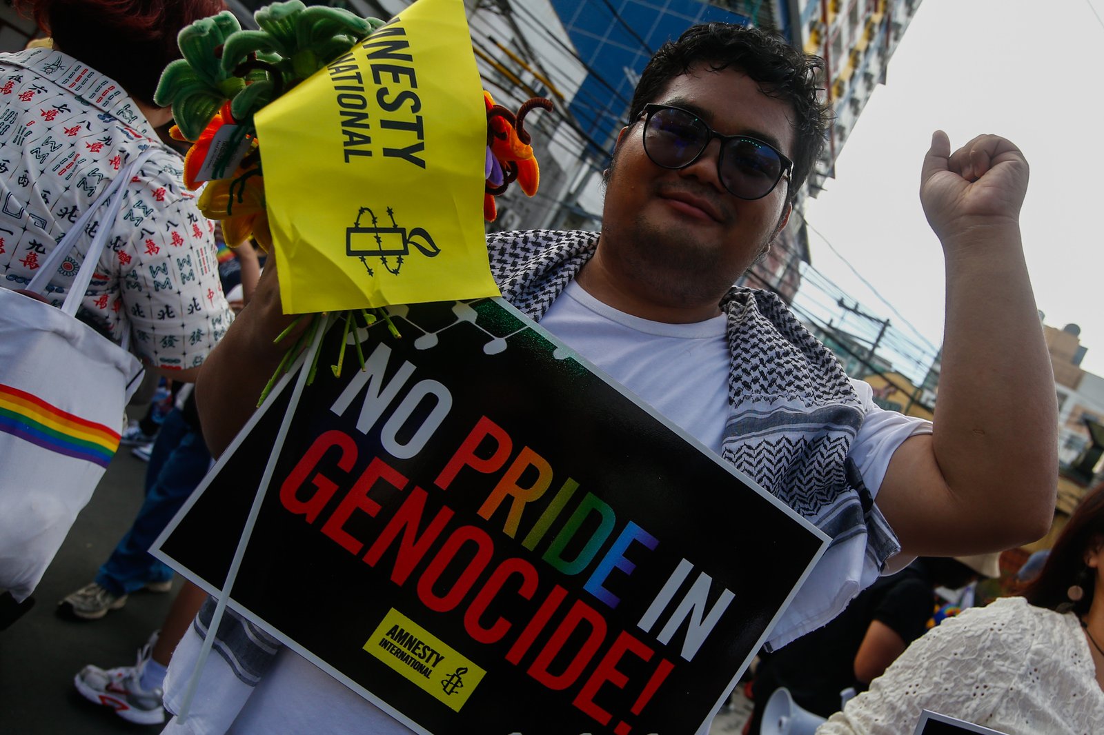 Members of the LGBTQIA+ community and their allies gather at Remedios Circle in Manila on 27 June 2026 during the Metro Pride March and Festival, calling for equality, dignity, justice, and human rights.